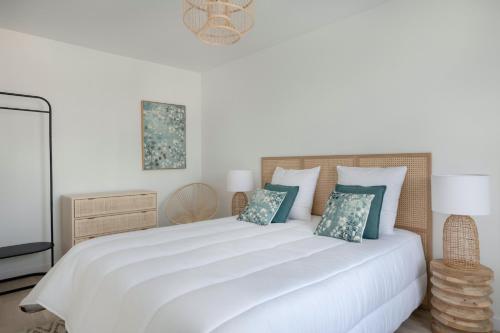 Ένα ή περισσότερα κρεβάτια σε δωμάτιο στο Pour un agréable séjour en bord de mer pour 4 pers