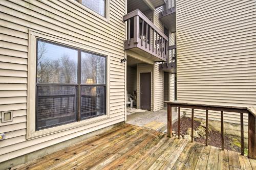 a house with a deck and a balcony at Deck and Grill Modern Sugar Mtn Escape! in Sugar Mountain