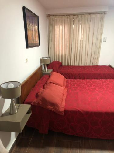 Letto o letti in una camera di Hotel San Carlos