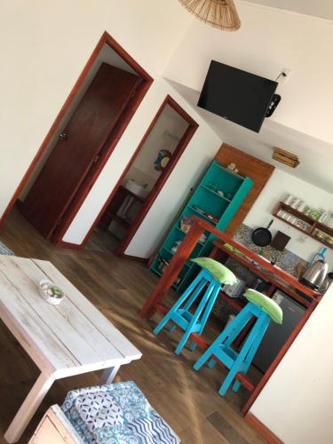 an overhead view of a living room with two stools at Posada Agua Marina in La Paloma