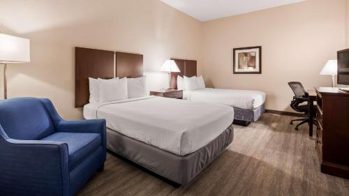 Ένα ή περισσότερα κρεβάτια σε δωμάτιο στο Best Western Tampa
