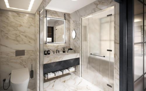 a bathroom with a shower and a sink at Grand InterContinental Seoul Parnas, an IHG Hotel in Seoul