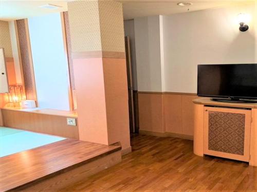 TV a/nebo společenská místnost v ubytování HOTEL 紅-bin-