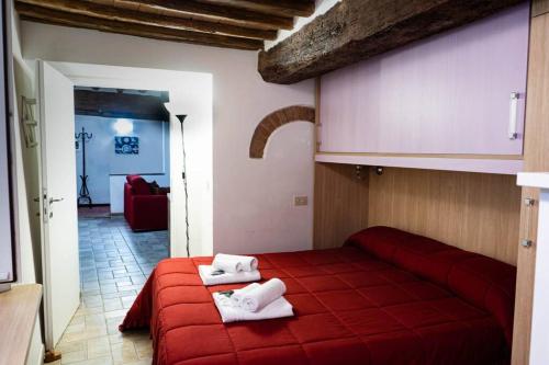 Posteľ alebo postele v izbe v ubytovaní Bargello House by FrancigenaApartments
