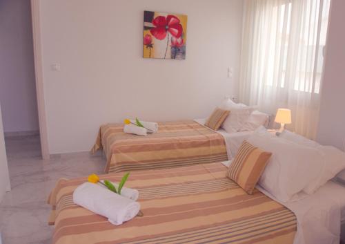 Postel nebo postele na pokoji v ubytování New Big Modern City Center Apartment