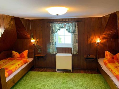 Katil atau katil-katil dalam bilik di Berghaus Carlsfeld