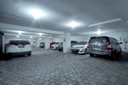 a parking lot with several cars parked in it at D'Paragon Bukit Sari in Semarang