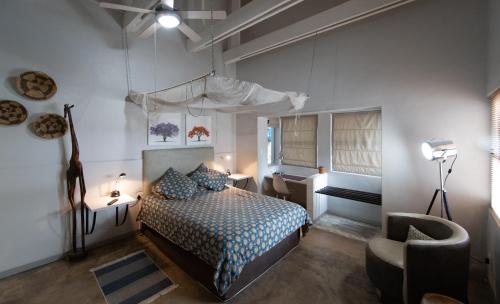 Ένα ή περισσότερα κρεβάτια σε δωμάτιο στο Vondelhof Guesthouse
