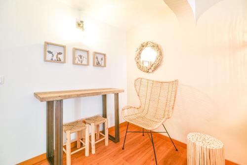 a room with a table and a chair at Salema Eco Camp - Sustainable Camping & Glamping in Salema