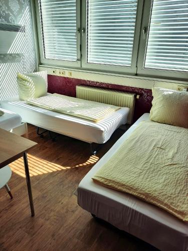 Postel nebo postele na pokoji v ubytování Oase Residence