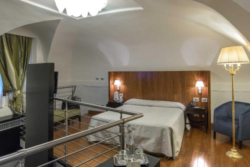 Postel nebo postele na pokoji v ubytování Albergo del Senato