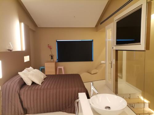 Ένα ή περισσότερα κρεβάτια σε δωμάτιο στο Motel Latino
