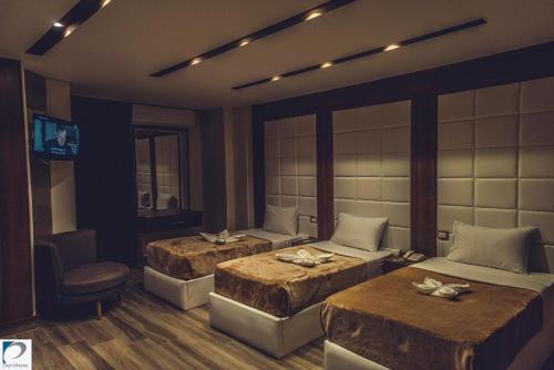 Телевизор и/или развлекательный центр в Panorama Portsaid Hotel