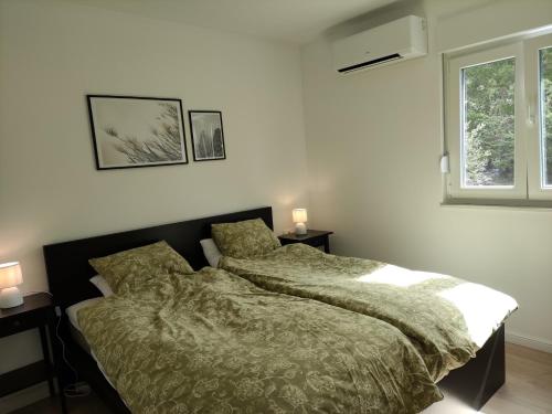 Posteľ alebo postele v izbe v ubytovaní Apartment Sebastijan