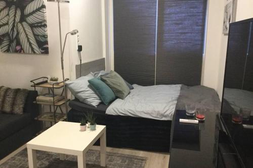 Tempat tidur dalam kamar di Studio E