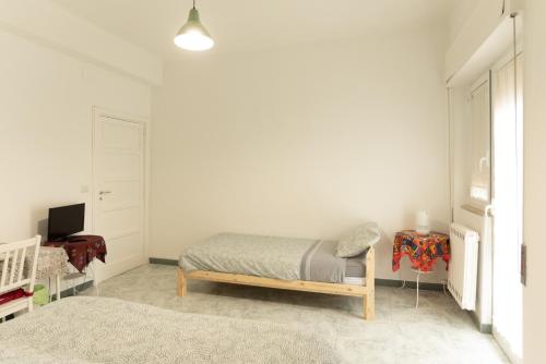 Ένα ή περισσότερα κρεβάτια σε δωμάτιο στο Archita Guest House