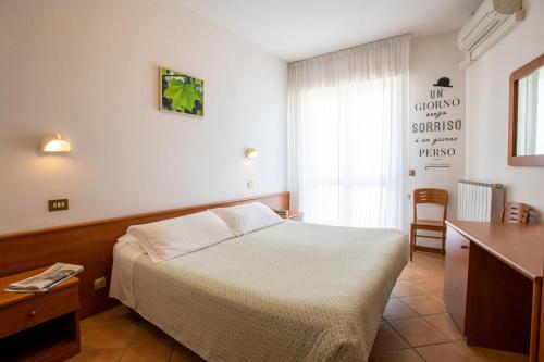 Cama o camas de una habitación en Eco-Hotel Edy