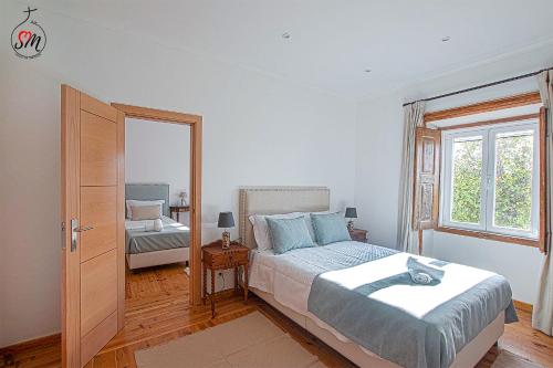Ένα ή περισσότερα κρεβάτια σε δωμάτιο στο Quinta da Fortaleza