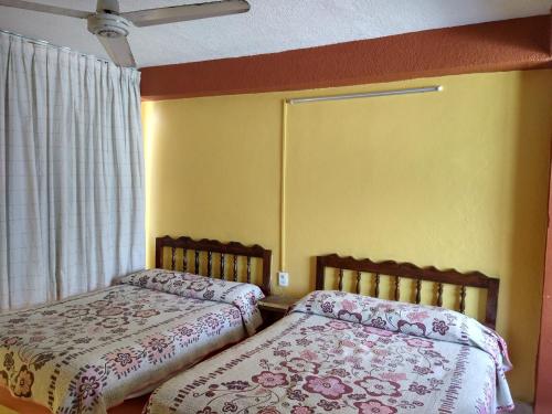 Cama o camas de una habitación en Hotel Olimar