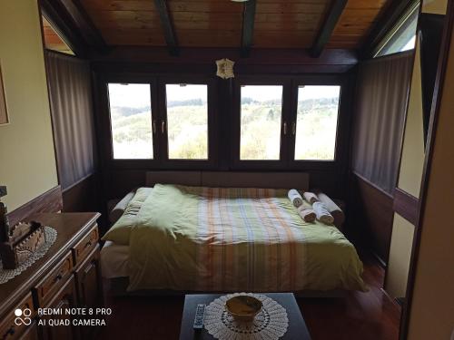 Una cama o camas en una habitación de Vila Pajo
