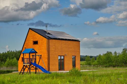 Kawasan permainan kanak-kanak di Domek na Roztoczu Sauna & Jacuzzi