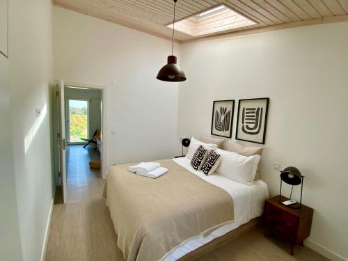 Katil atau katil-katil dalam bilik di Tavira-Quinta da Janela Azul