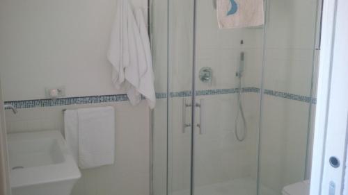 a bathroom with a shower and a sink at Villa Casale Ravello Residence in Ravello