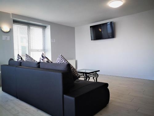 TV a/nebo společenská místnost v ubytování Bella Vista Hotel & Self Catering Suites
