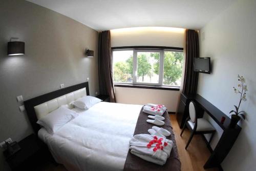 Säng eller sängar i ett rum på Quinta de Resela
