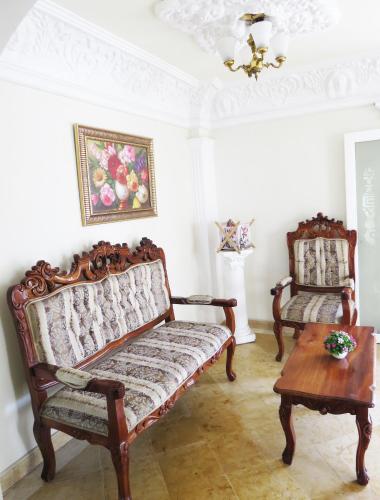 Χώρος καθιστικού στο Hotel Royal Puebla