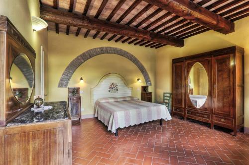 Ένα ή περισσότερα κρεβάτια σε δωμάτιο στο Agriturismo Il Selvino