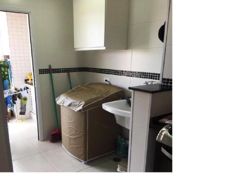 Et badeværelse på Apartamento - Residencial Vista Verde