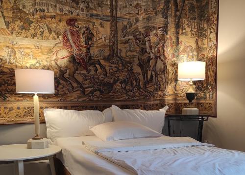 Säng eller sängar i ett rum på Villa Toscana Luxury Loft