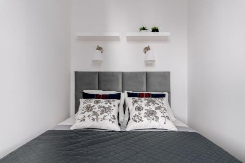 Postel nebo postele na pokoji v ubytování Dream4You Apartments