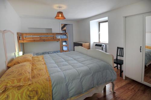 Postel nebo postele na pokoji v ubytování B&B Rocca di Bajedo