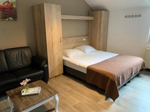 Appartementen De Zegelskoëlにあるベッド