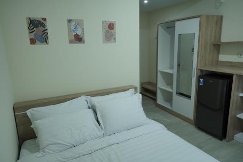 Ένα ή περισσότερα κρεβάτια σε δωμάτιο στο CASAKITA exclusive guest house