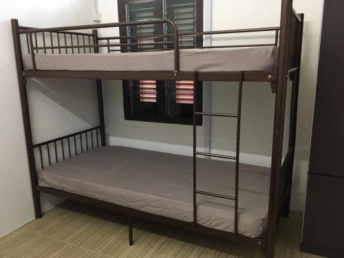 Homey Hostel tesisinde bir ranza yatağı veya ranza yatakları