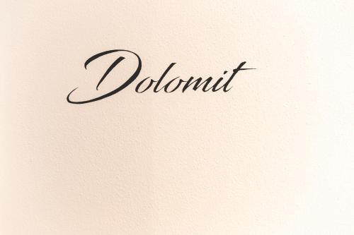 a sign with the word dolphin written on a paper at Residence Alpina in Santa Maddalena in Casies