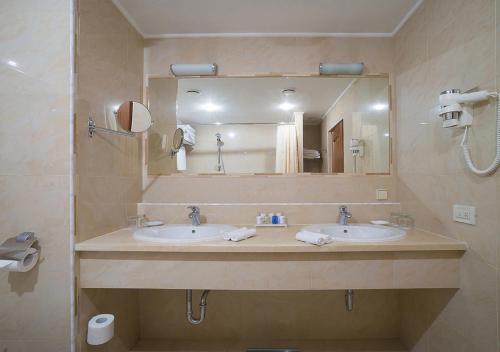 
Ванная комната в Рэдиссон Славянская Отель и Бизнес Центр

