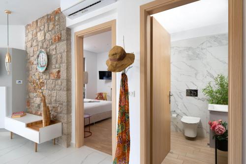 a room with a door leading to a bedroom at Ikaros Villa in Pefki Rhodes