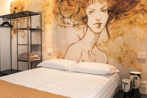 Кровать или кровати в номере La Locanda dei Cavalieri Country House
