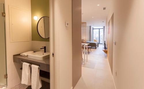 Et badeværelse på Apartamentos Málaga Premium - Calle Granada