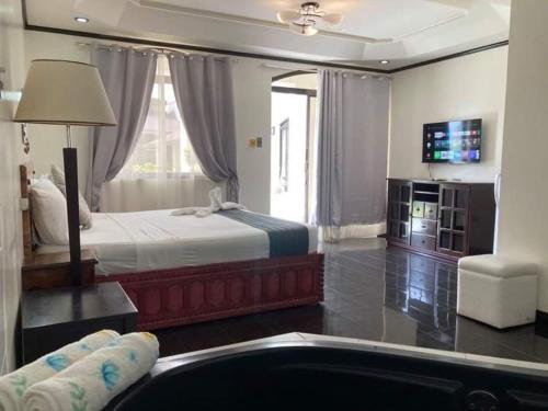 Katil atau katil-katil dalam bilik di Ettamogah Hotel Inc.