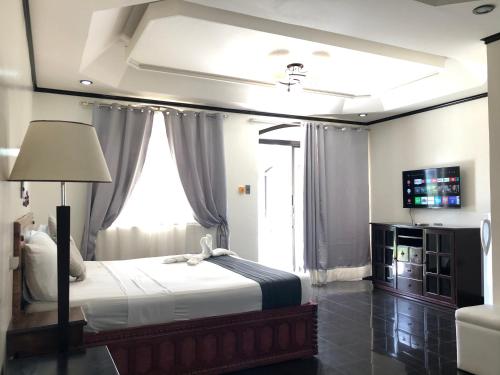 Postel nebo postele na pokoji v ubytování Ettamogah Hotel Inc.