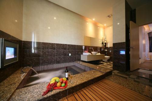 Ett badrum på Hua Mu Lan Hotel