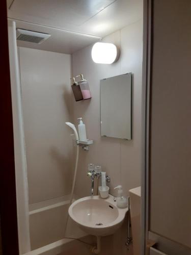 Koupelna v ubytování OHTO Ryokan
