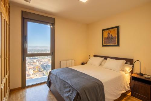 Легло или легла в стая в Atico Top Granada, Penthouse, 18-19th floor, City Centre, Views, Terrace, Free Parking