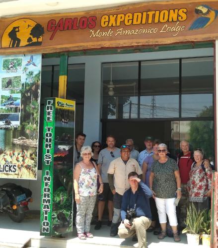 a group of people standing in front of a store at Monte Amazonico Lodge in Tambopata