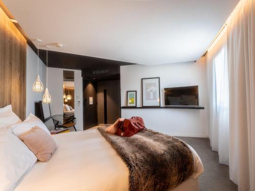 Postel nebo postele na pokoji v ubytování Mercure Valence